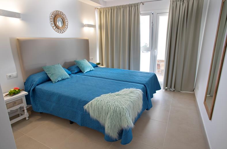 Slaapkamer van een 2-kamerappartement van La Baranda